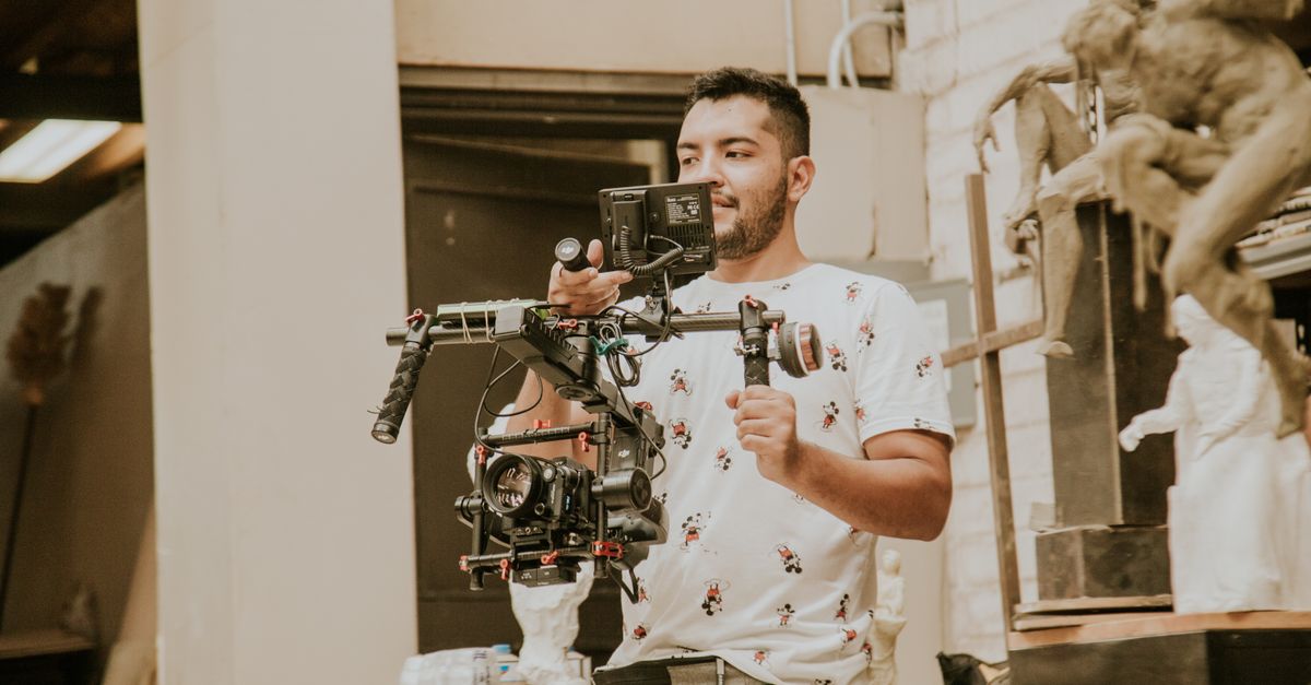 Videographer filming a scene